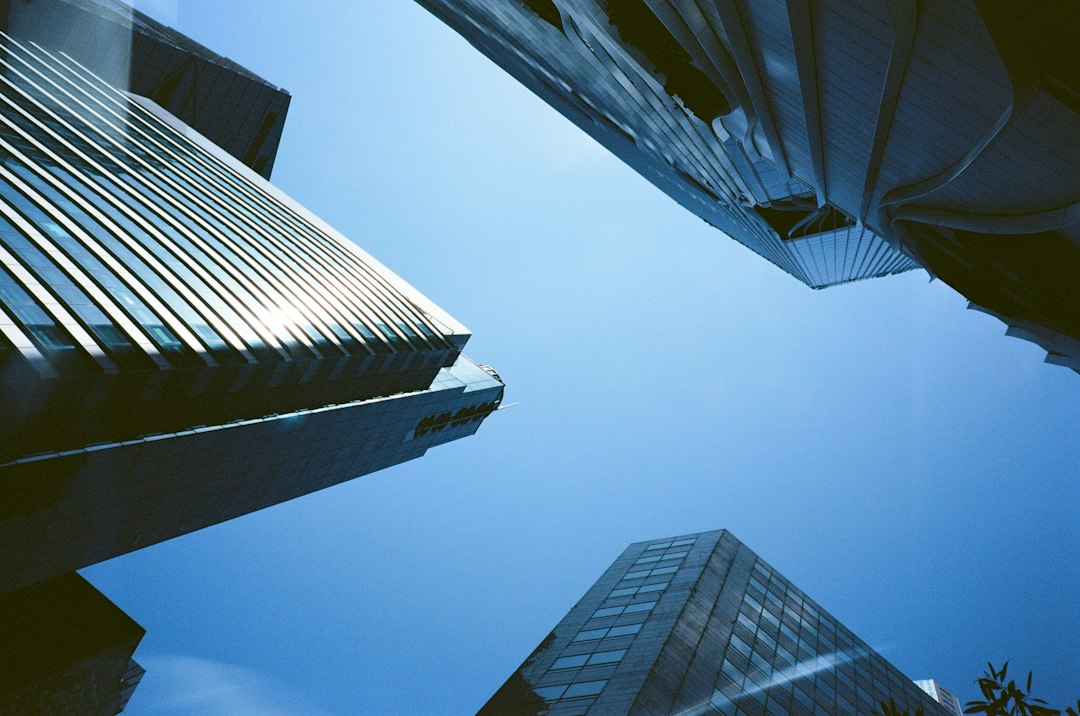 Looking up at tall buildings in a city